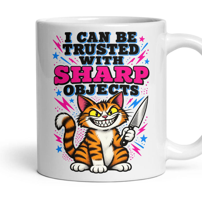 I CAN BE TRUSTED WITH SHARP OBJECTS mug, 11oz white ceramic, handle right