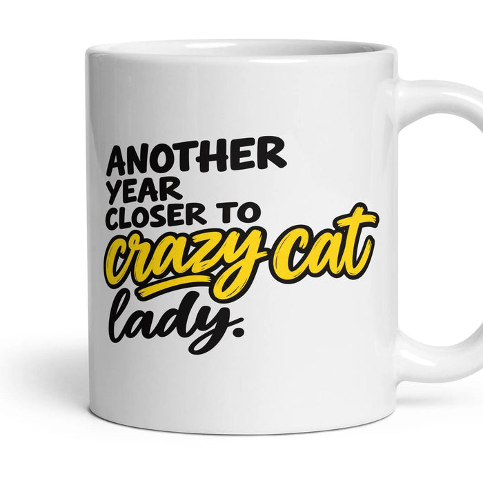 Another year closer to crazy cat lady. mug, 11oz white ceramic, handle right