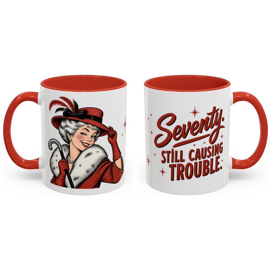 Seventy. Still causing trouble. mug, 11oz white ceramic, red handle and interior, handle right